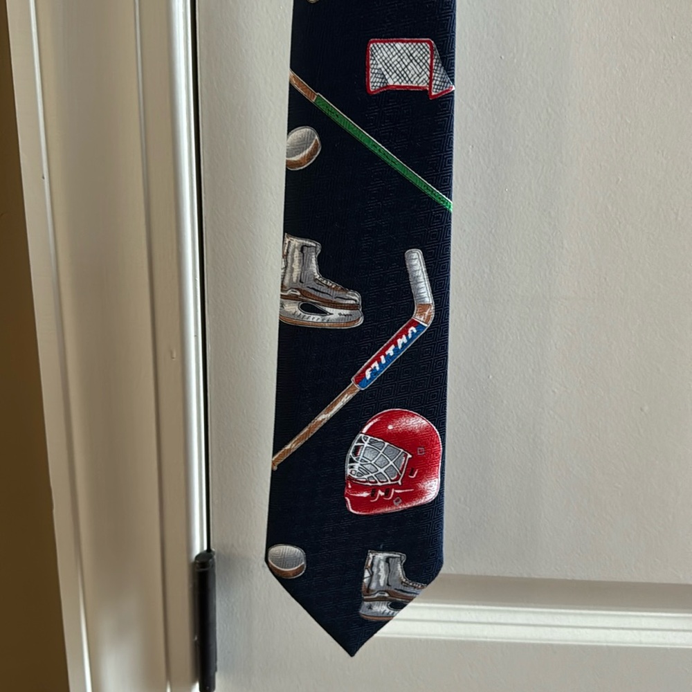 Ice Hockey Themed tie. Navy Blue.